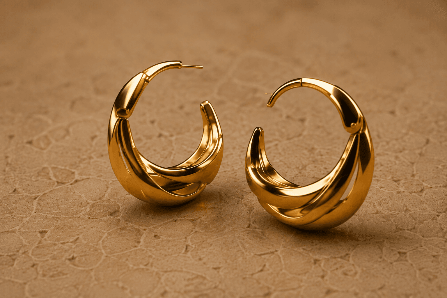 Sculptural polished gold earrings